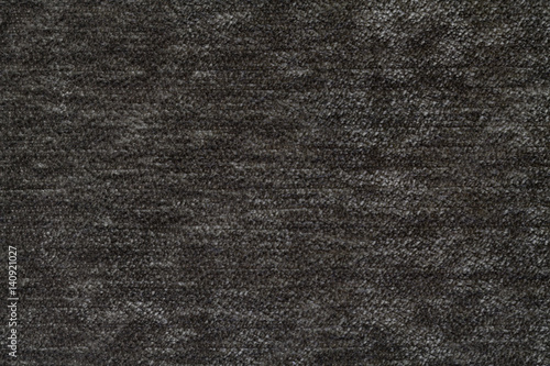Dark gray background of soft, fleecy cloth. Texture of textile closeup © nikol85