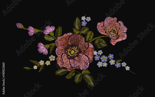 Embroidery colorful floral pattern with poppy and daisy flowers. Vector traditional folk fashion ornament on black background.