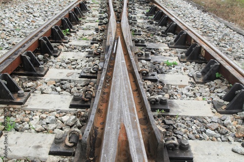 railway track on gravel for train transportation: Select focus with shallow depth of field :
