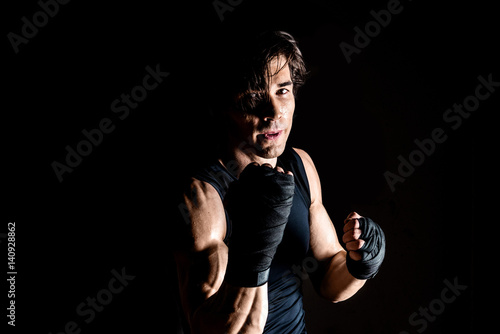 Muscular kickbox fighter