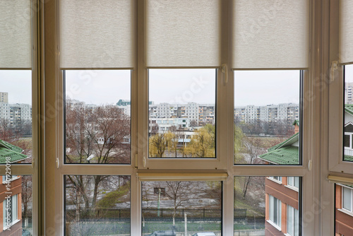 Window view on school stadium and buildings in center of chisinau  moldova