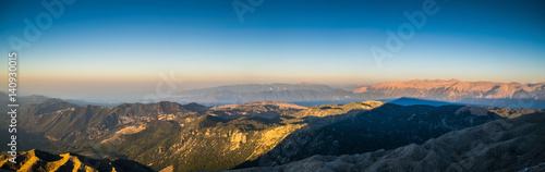 view from the top of Tahtali Mountain Range during sunrise on sea and valley, Turkey, Kemer