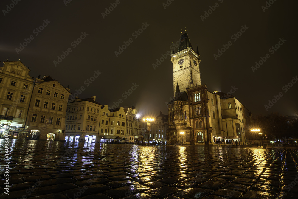 Tower at the Town Hall Square in Prague. At night after the rain.