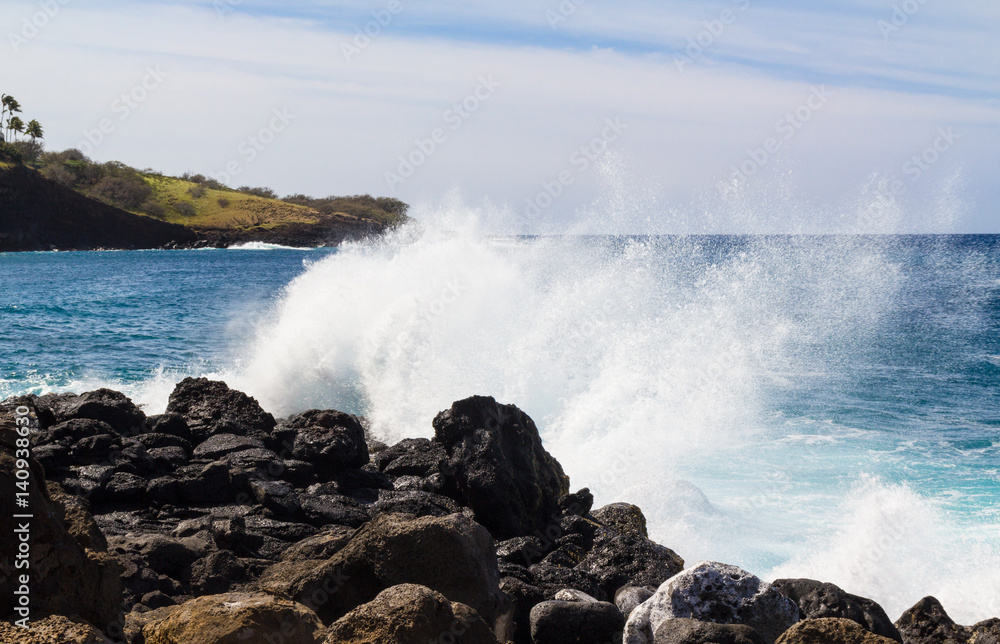 Spray from waves agains rocky shore in Hawaii Spray from waves agains rocky shore in Hawaii