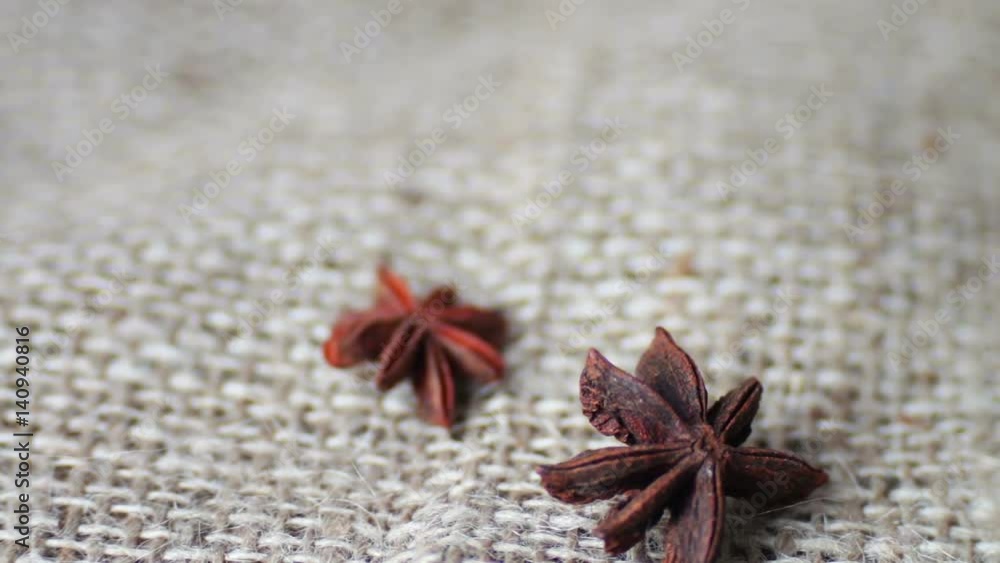 Cinnamon rods and star anise on the old cloth Cinnamon rods and star anise on the old cloth