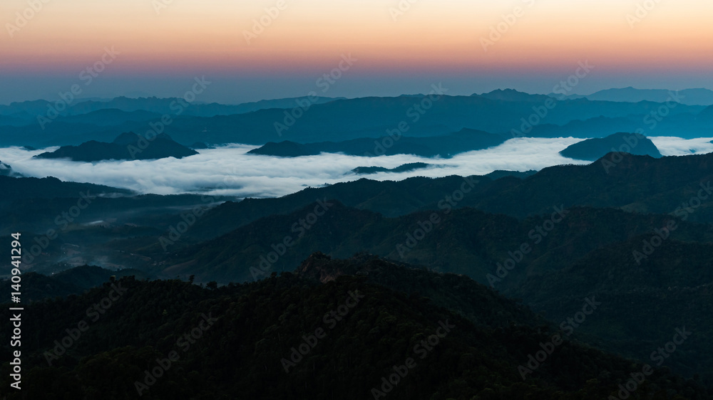 Mist atop a beautiful mountainThailand