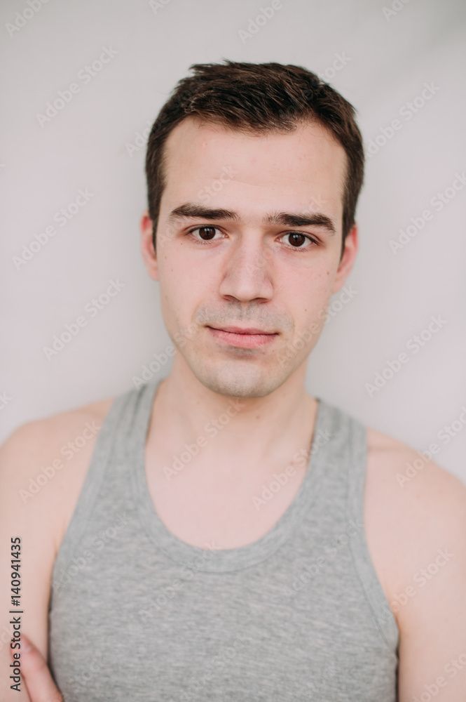 Close up portrait of a handsome young man on white Close up portrait of a handsome young man on white