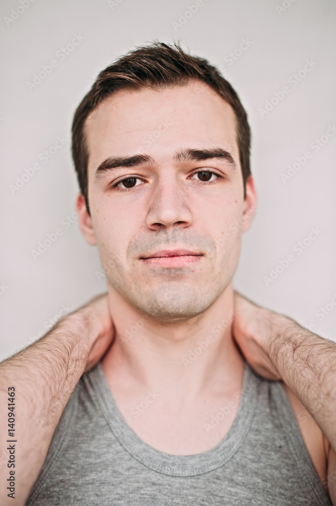 Close up portrait of a handsome young man on white Close up portrait of a handsome young man on white