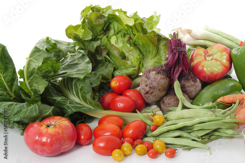 Different seasonal vegetables on white