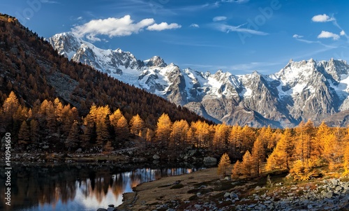 Autumn at Arpy lake, with Mont Blanc chain and Grand Jorasses. Province of Aosta, Aosta valley, Italy
