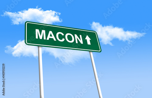 Road sign - Macon. Green road sign  signpost  on blue sky background.  3D-Illustration   