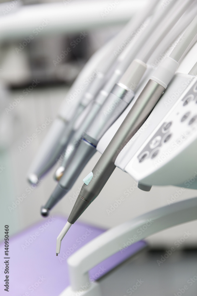 Close up view at set of dentist tools Close up view at set of dentist tools