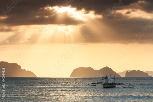 Sunset at Corong Corong beach, Palawan, Philippines photo