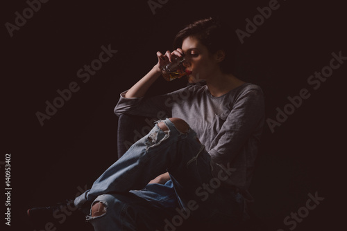 Young alcoholic woman