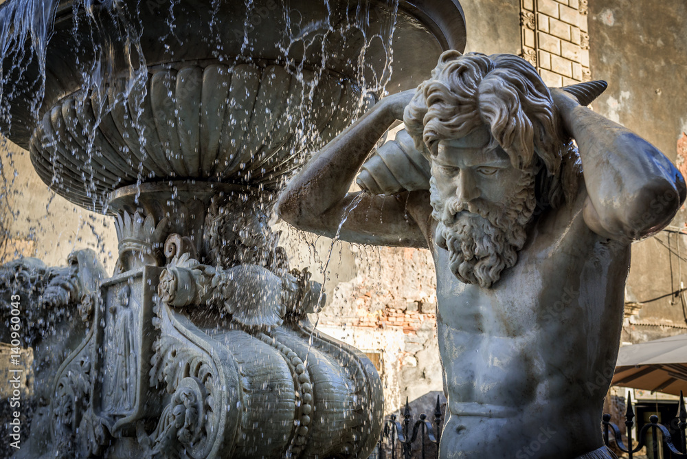 Amenano Fountain near Cathedral Square in Catania, Sicily, Italy