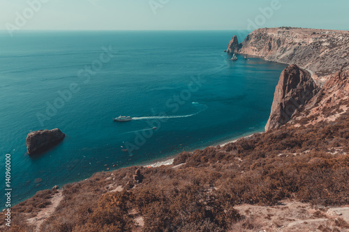 Crimea, Cape Fiolent. The tourist boat departs from Jasper beach.