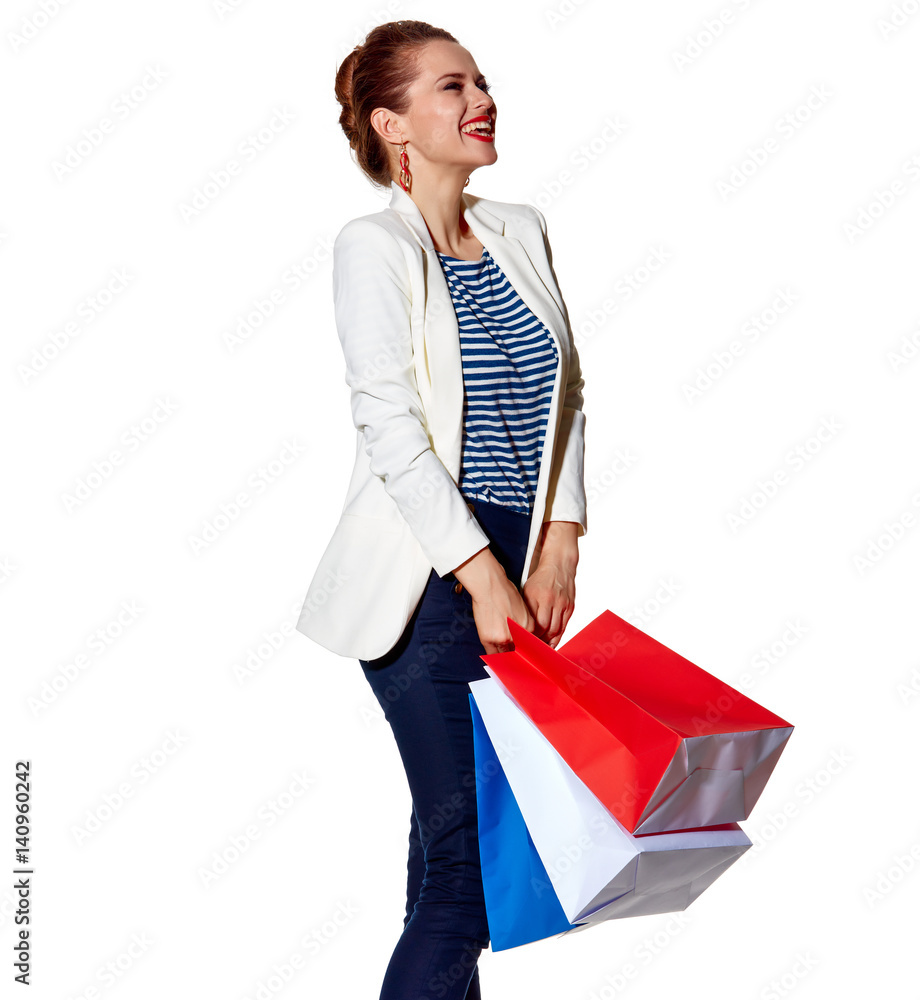Woman with shopping bags on white background looking aside Woman with shopping bags on white background looking aside