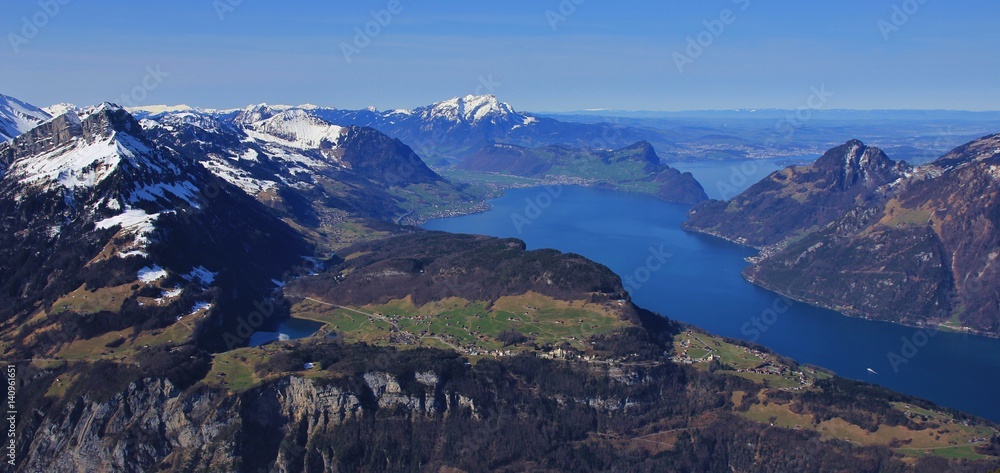 Spring in the Swiss Alps. View from mount Fronalpstock, Stoos. Seelisberg and lake Vierwaldstattersee.