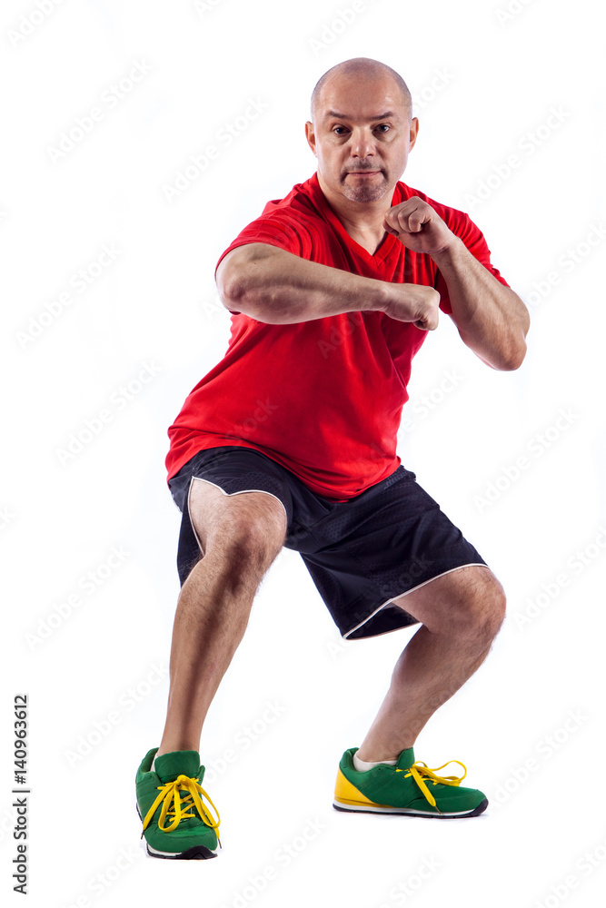 Studio portrait of fighting muscular man over white background Studio portrait of fighting muscular man over white background