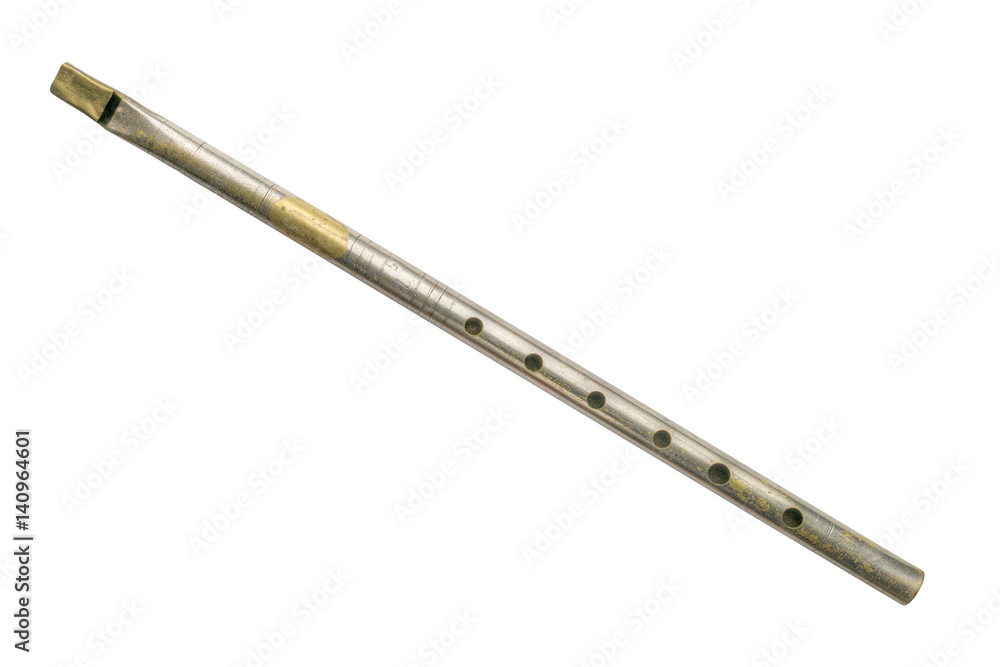 Old tin whistle aka penny whistle, isolated on white. Old tin whistle aka penny whistle, isolated on white.