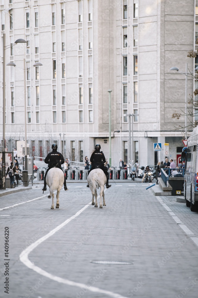 Policeman riding a horse in Madrid.