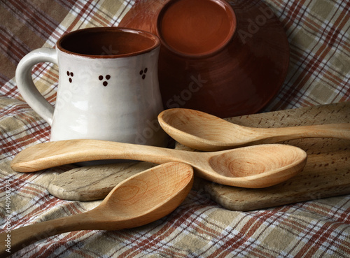 old dishes and wooden spoon