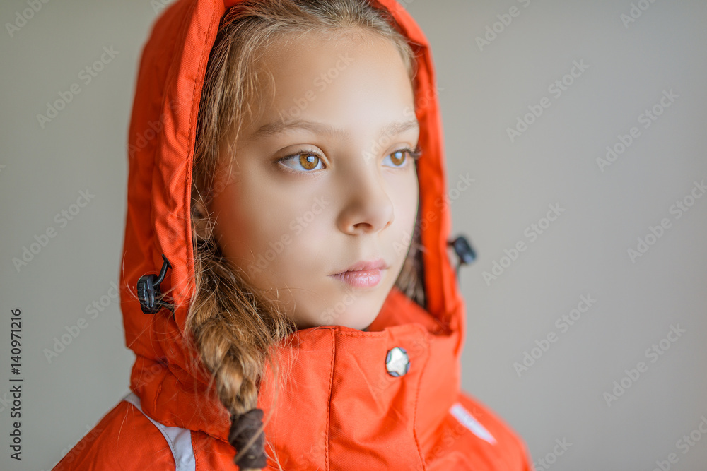 Beautiful little girl in red jacket with hood Stock Photo Adobe Stock