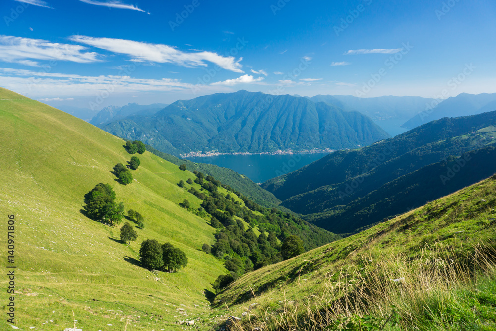 Hiking on peaks of Italian mountains with beautiful view to the lake Como
