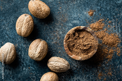 Nutmeg on dark background directly above copy space