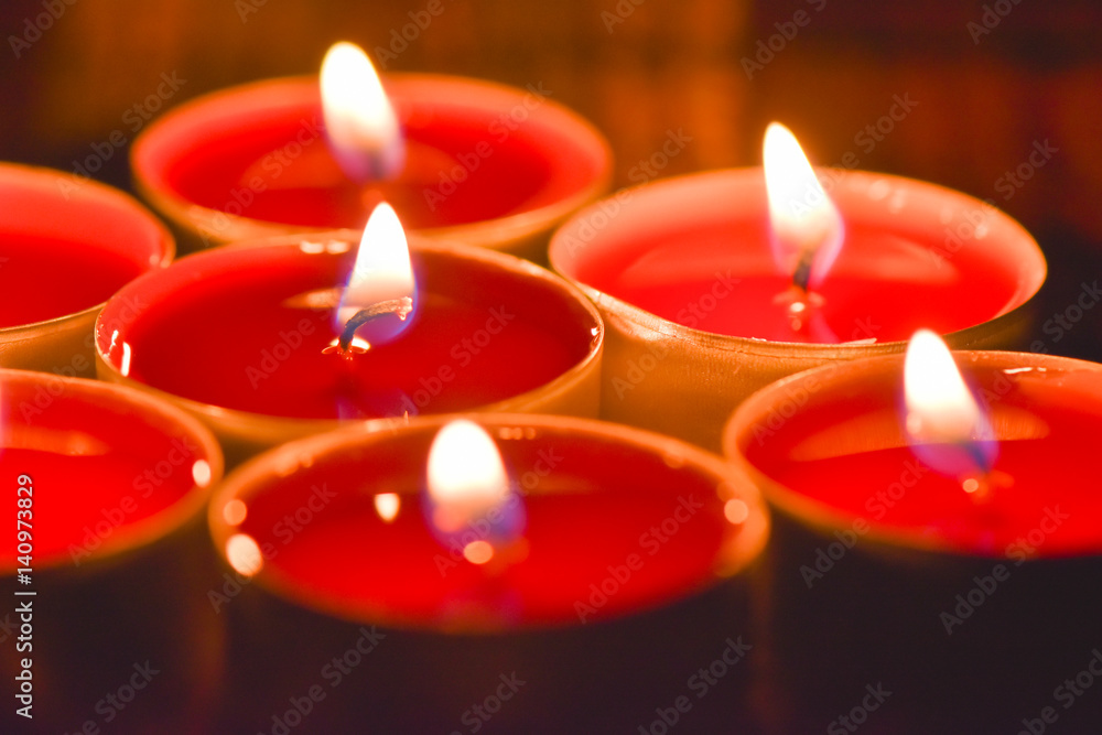Burning candles. Candles light background. Candle flame at night.