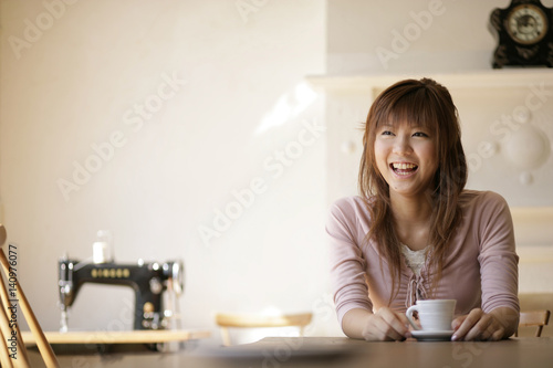 Smilig woman at cafe photo