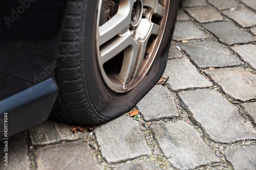 Damaged Flat Tire Of A Car