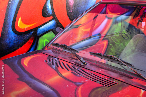 graffiti reflection on the car