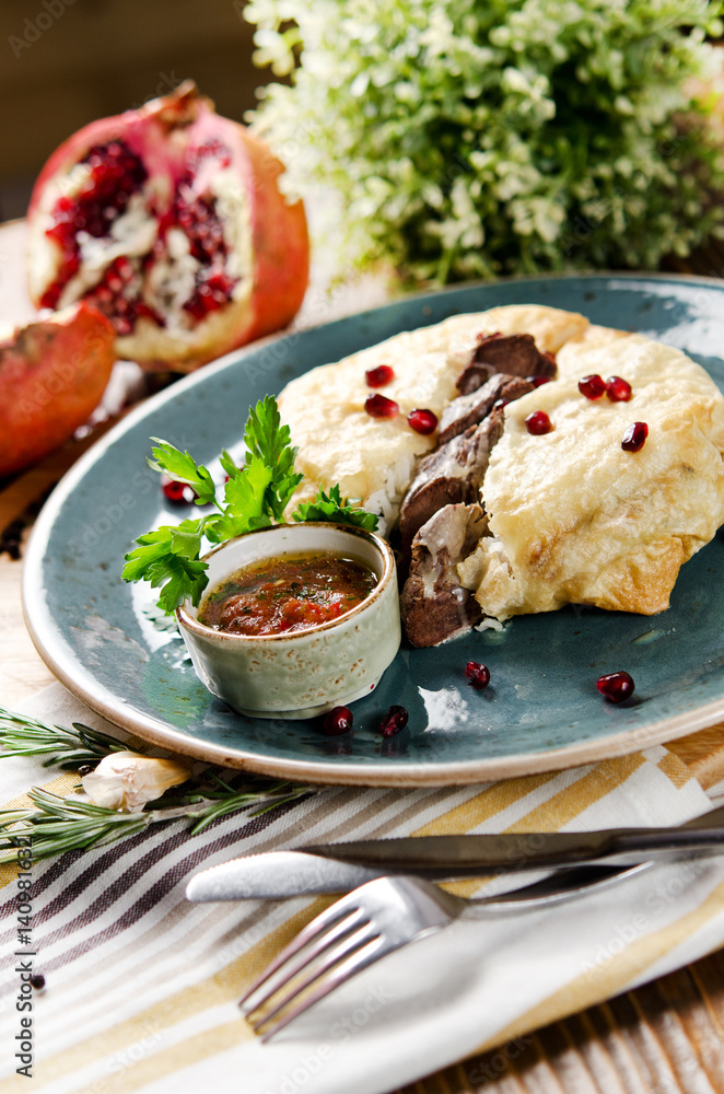 Pilaf in bread with lamb. Traditional Azerbaijani dish