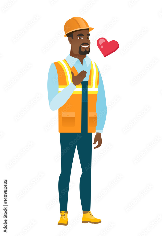 African-american builder holding hand on his chest