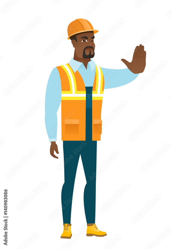 African-american builder showing stop hand gesture African-american builder showing stop hand gesture
