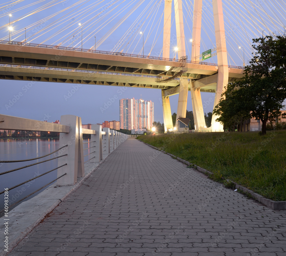 Cable stayed bridge and embankment of Neva river.