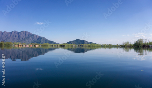 Mirrored reflection of mountains and lake