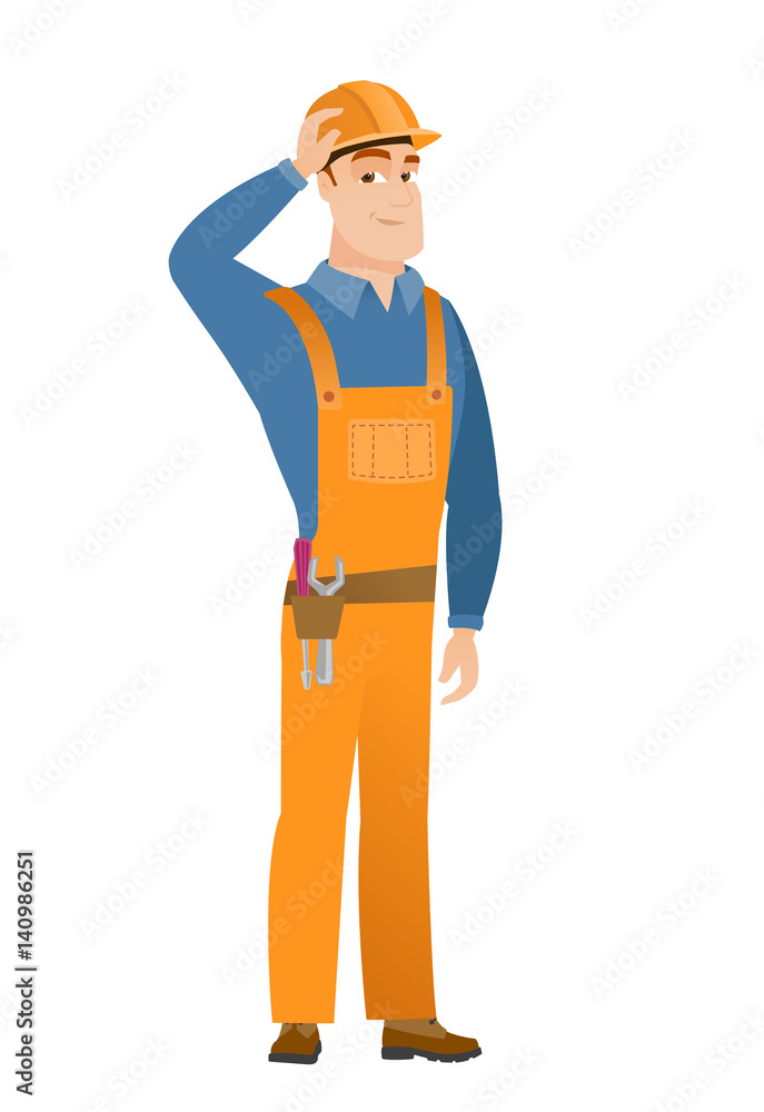 Young caucasian builder in workwear and hard hat. Young caucasian builder in workwear and hard hat.