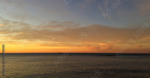 Sunset sky and horizon over ocean © Ben R