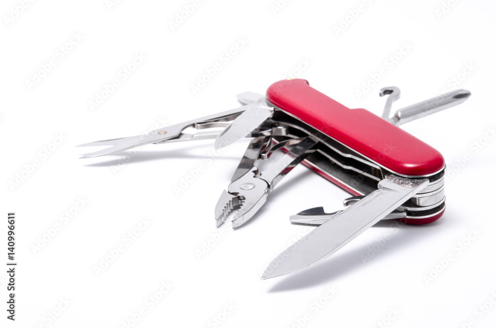 Red-Knife multi-tool, isolated on white background Red-Knife multi-tool, isolated on white background