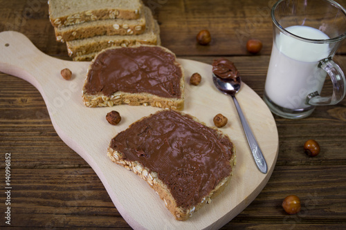 Bread with chocolate cream and milk