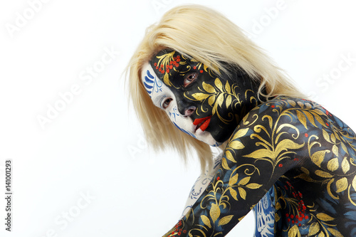 Fotografie body art young beautiful girl in style hohloma