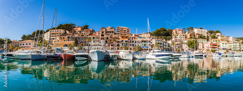 Fototapeta Naklejka Na Ścianę i Meble -  Beautiful panorama view of Port de Soller harbor with luxury boats and mediterranean buildings on Majorca Spain