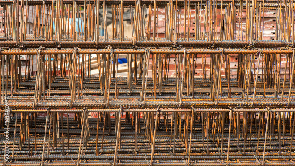 Stack of rustic steel rods at building site Stack of rustic steel rods at building site