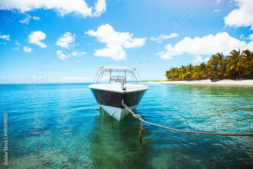 Fototapeta Naklejka Na Ścianę i Meble -  Sailing boat on crystal blue water of ocean. Tropical scene. Amazing landscape. Summer vacation concept.