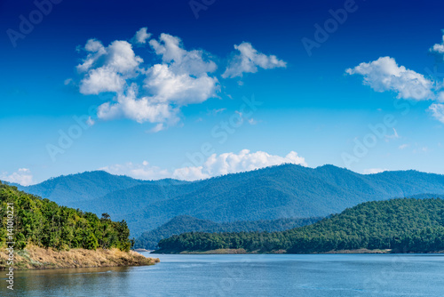 Lake with mountain and blue sky background © cjansuebsri