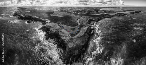 Black and white aerial panorama of Thunder Point lookout and Warrnambool, Victoria, Australia