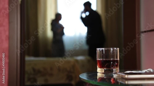 Man swears with an arab girl. Crime scene with domestic violence, husband attacks his wife