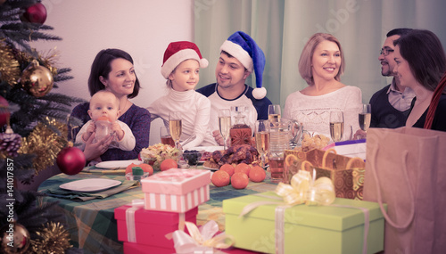 Big family gathering together for Christmas at home